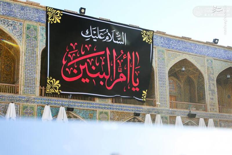 عکس/ نصب پرچم عزای ام‌الشهداء در حرم علوی
