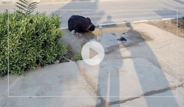 ماجرای عکس پرحاشیه زنی که مشغول آب خوردن است