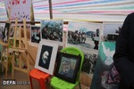 تصاویر/ برپایی غرفه نقاشی دفاع مقدس در ایلام